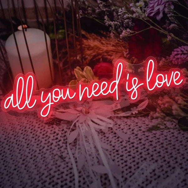 "All U Need is Love" neon sign - a vibrant décor choice!