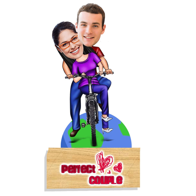Customized "Couple on cycle" caricature cutout with wooden stand - HEARTSLY
