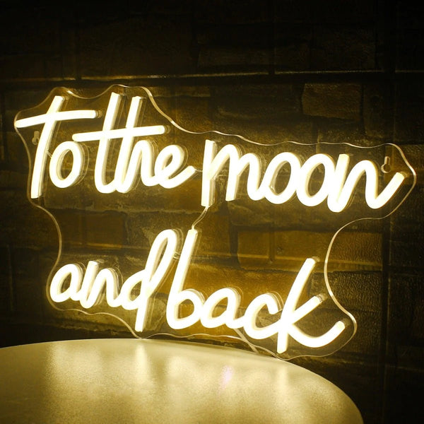 "To the moon and back"  love neon sign